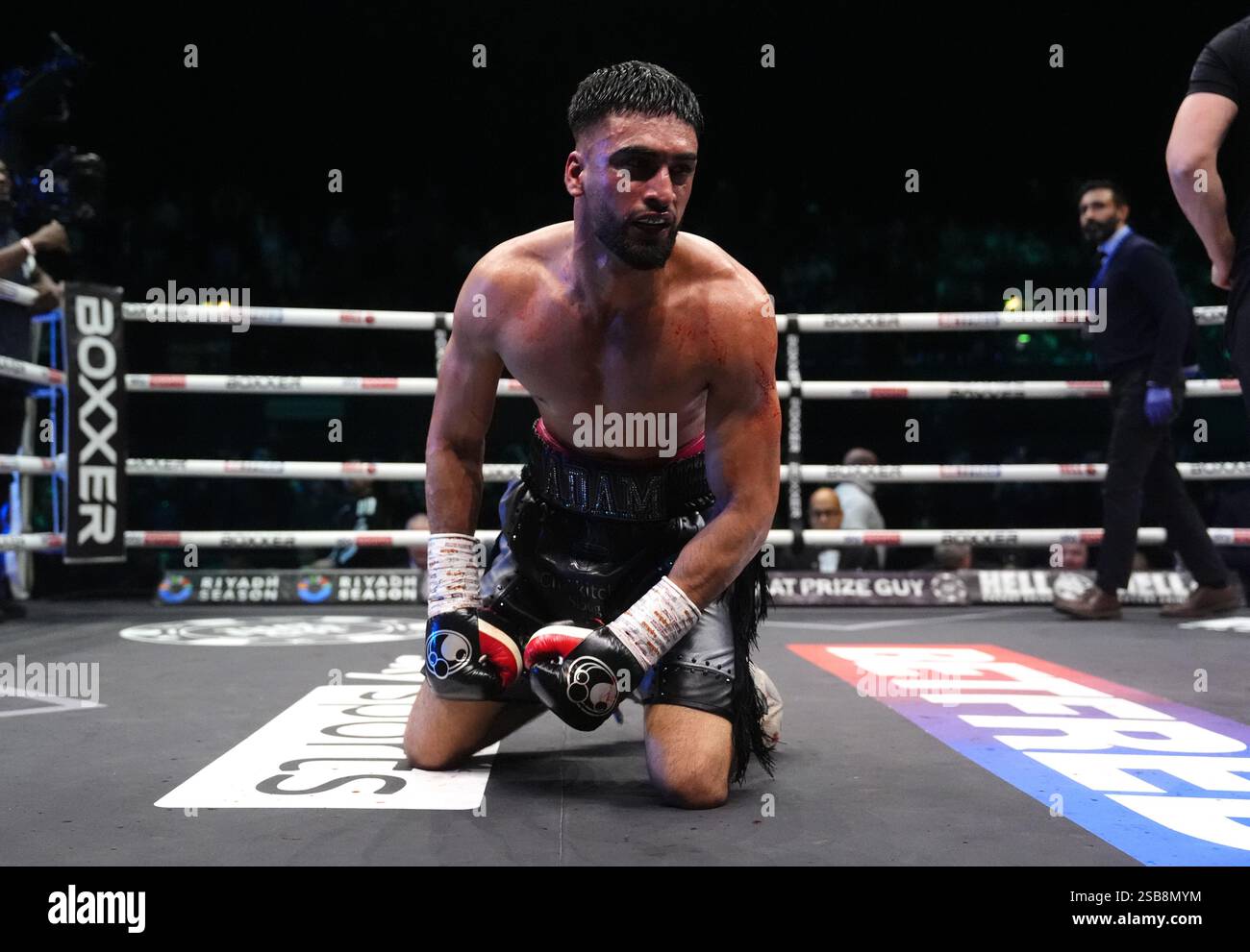Adam Azim celebrates victory against Sergey Lipinets (not pictured ...