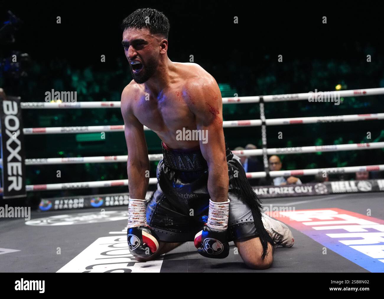 Adam Azim celebrates victory against Sergey Lipinets (not pictured ...