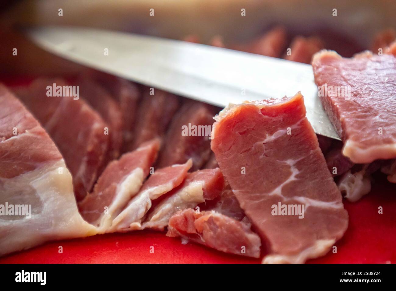 Traditional rustic salted sun-dried meat Stock Photo - Alamy