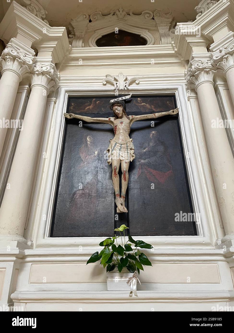 Nardo, Italy. Crucifix inside the 16th century Church of Saint Dominic. - Smartphone Captured Stock Image