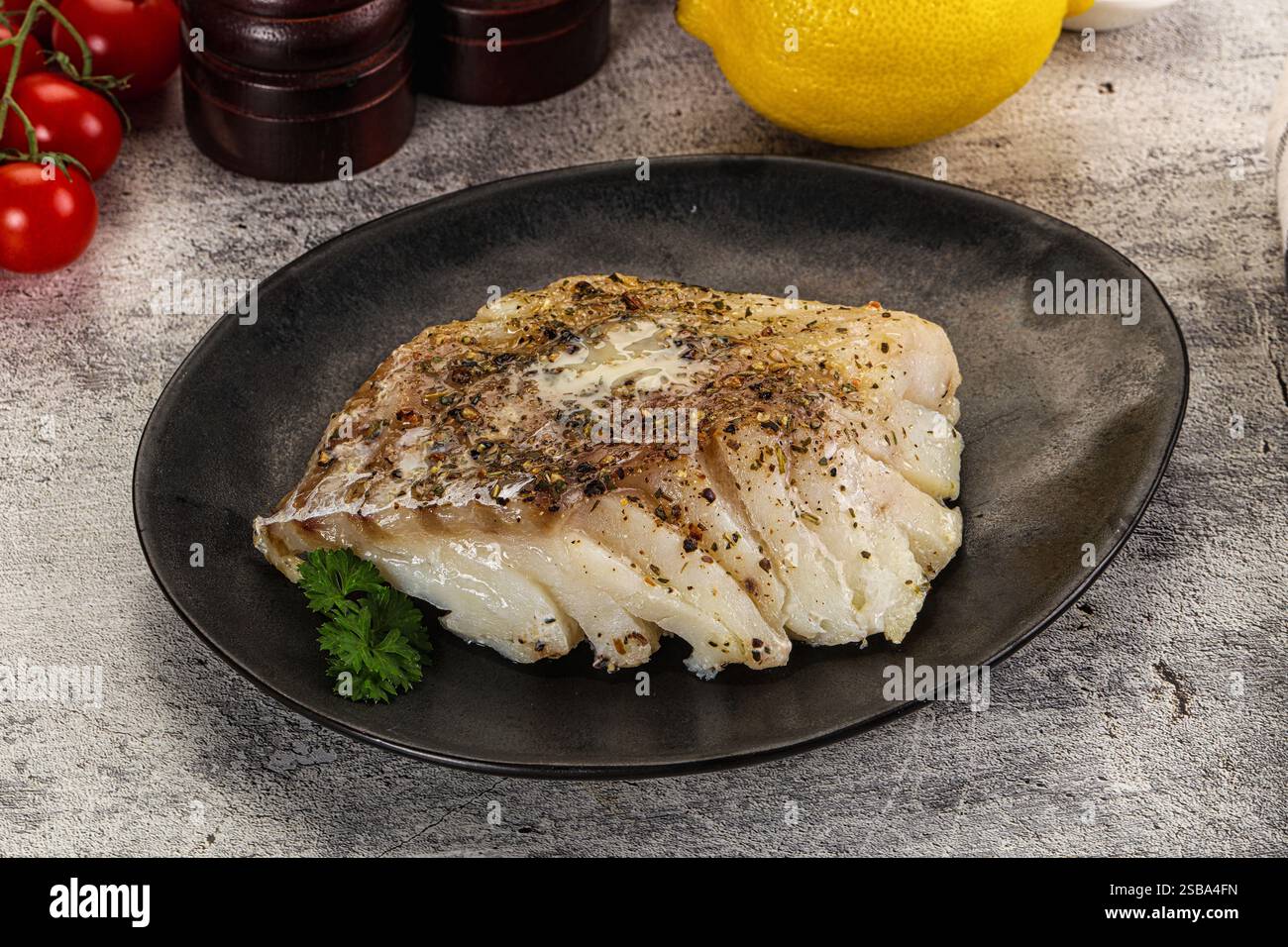 Dietary Baked cod fish fillet with spices Stock Photo - Alamy