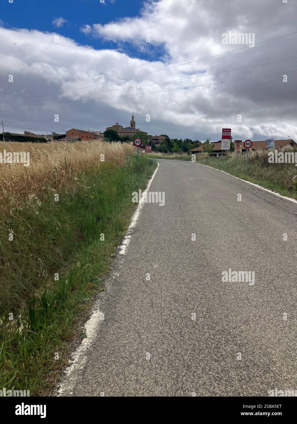 Approaching Sansol, a small village in Navarre, Spain with the Baroque Church of San Zoilo standing out in the landscape - Smartphone Captured Stock Image