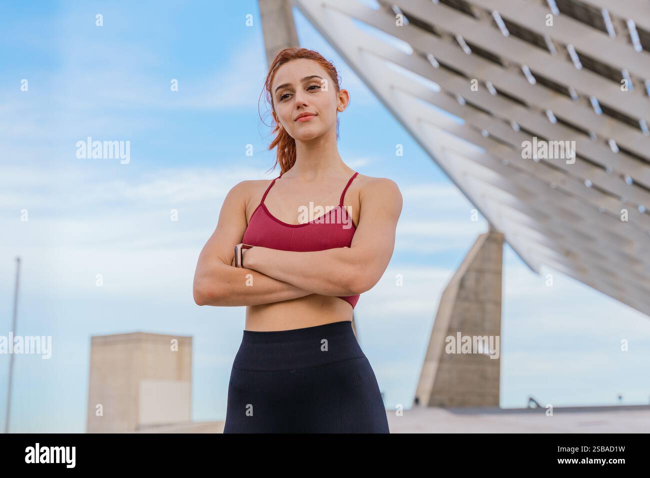 Muscular woman arms crossed hi-res stock photography and images - Alamy