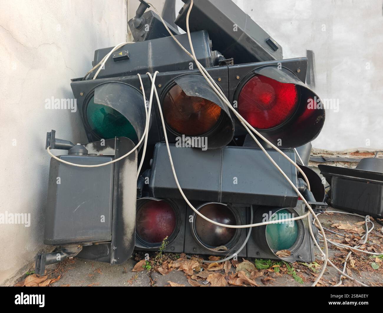Dismantled old traffic lights on the ground Stock Photo
