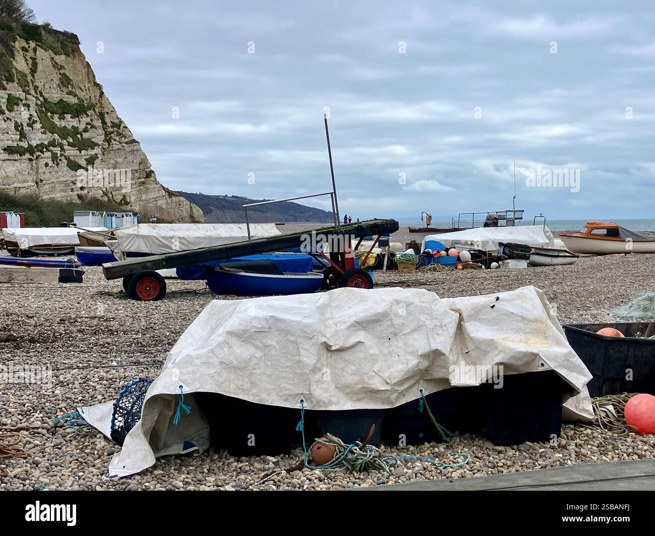 Fishing Boats and Equipment on the Beach, Beer, Devon - Smartphone Captured Stock Image