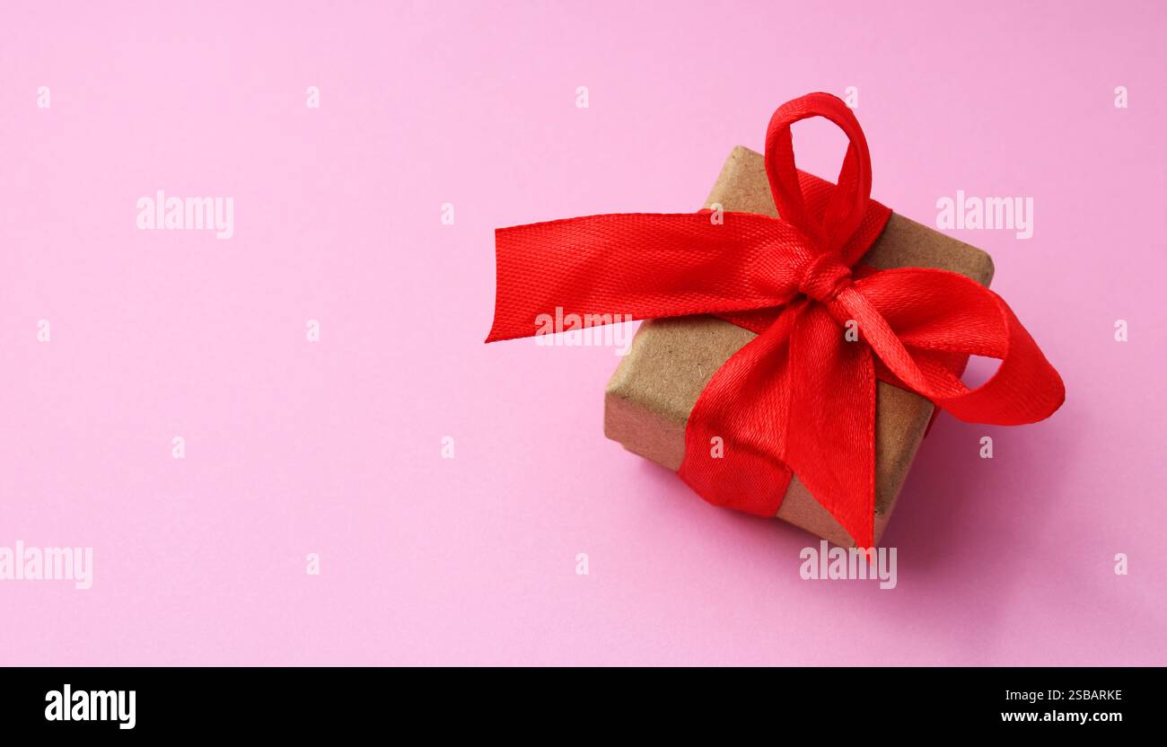 Gift box with red bow Stock Photo