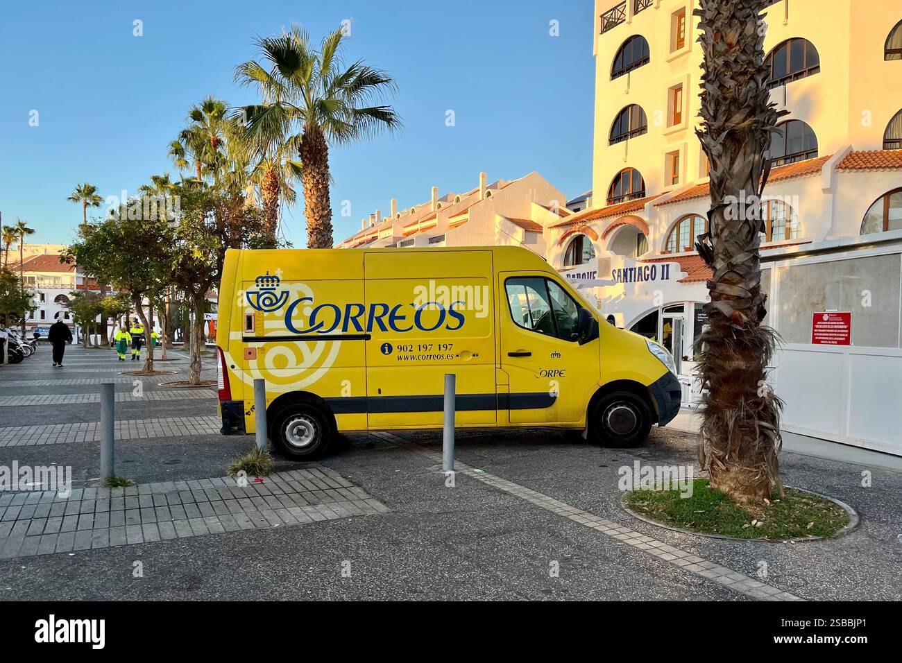 Yellow Correos Mail Van parked in Playa de las Américas. Arona, Tenerife. Canary Islands, Spain. 15th January 2025. - Smartphone Captured Stock Image