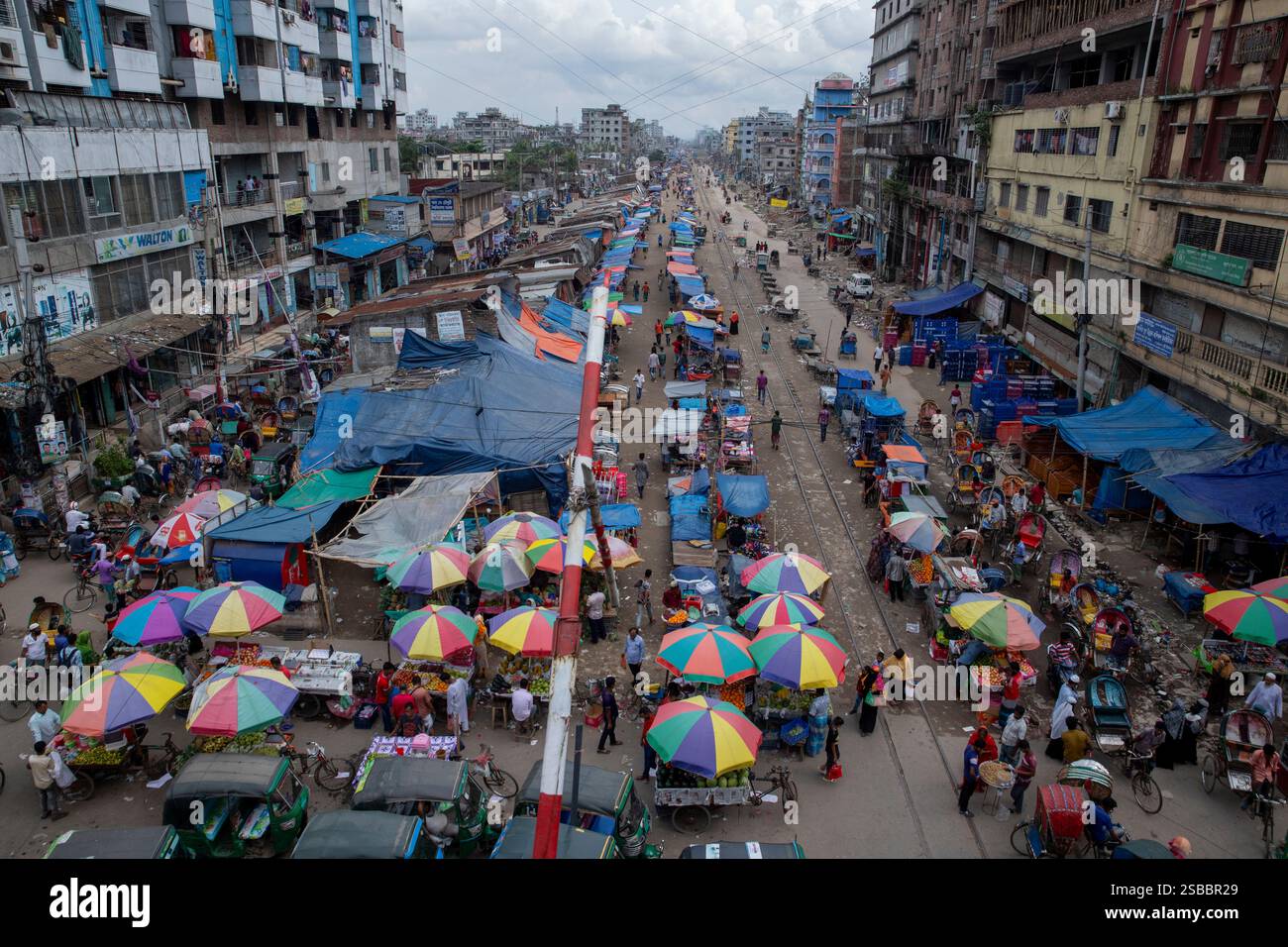 Makeshift shops line the Dhaka-Narayanganj railway tracks in Jurain ...