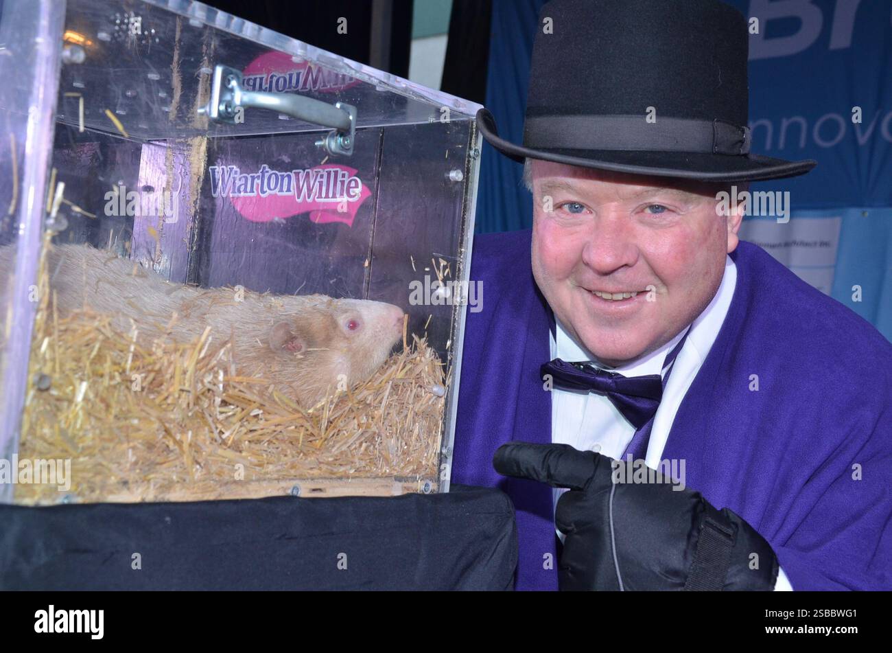 Wiarton mayor Jay Kirkland points to Wiarton Willie during a Groundhog