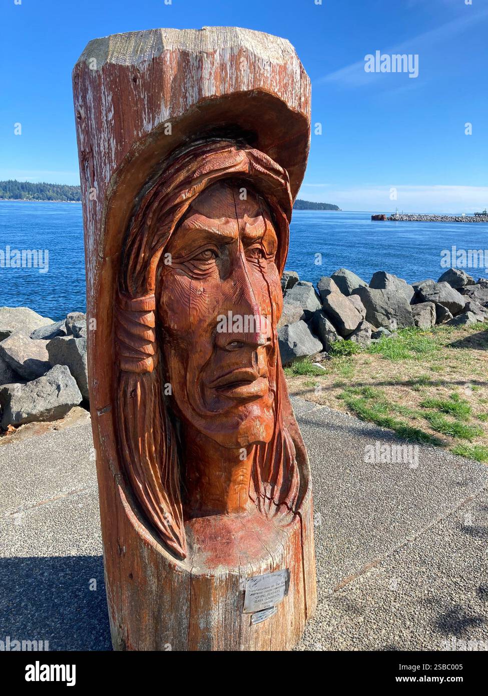 Wood carving at Campbell River waterfront, Vancouver Island, British Columbia, Canada - Smartphone Captured Stock Image