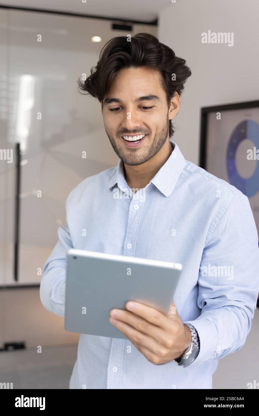 Positive project manager man using modern technology for work Stock ...