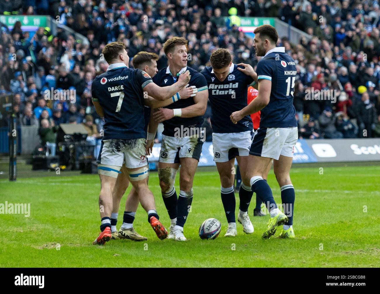 EDINBURGH, SCOTLAND - FEBRUARY 1:  Scotland centre, Huw Jones, is mobbed by teammates after scoring his second try. Stock Photo