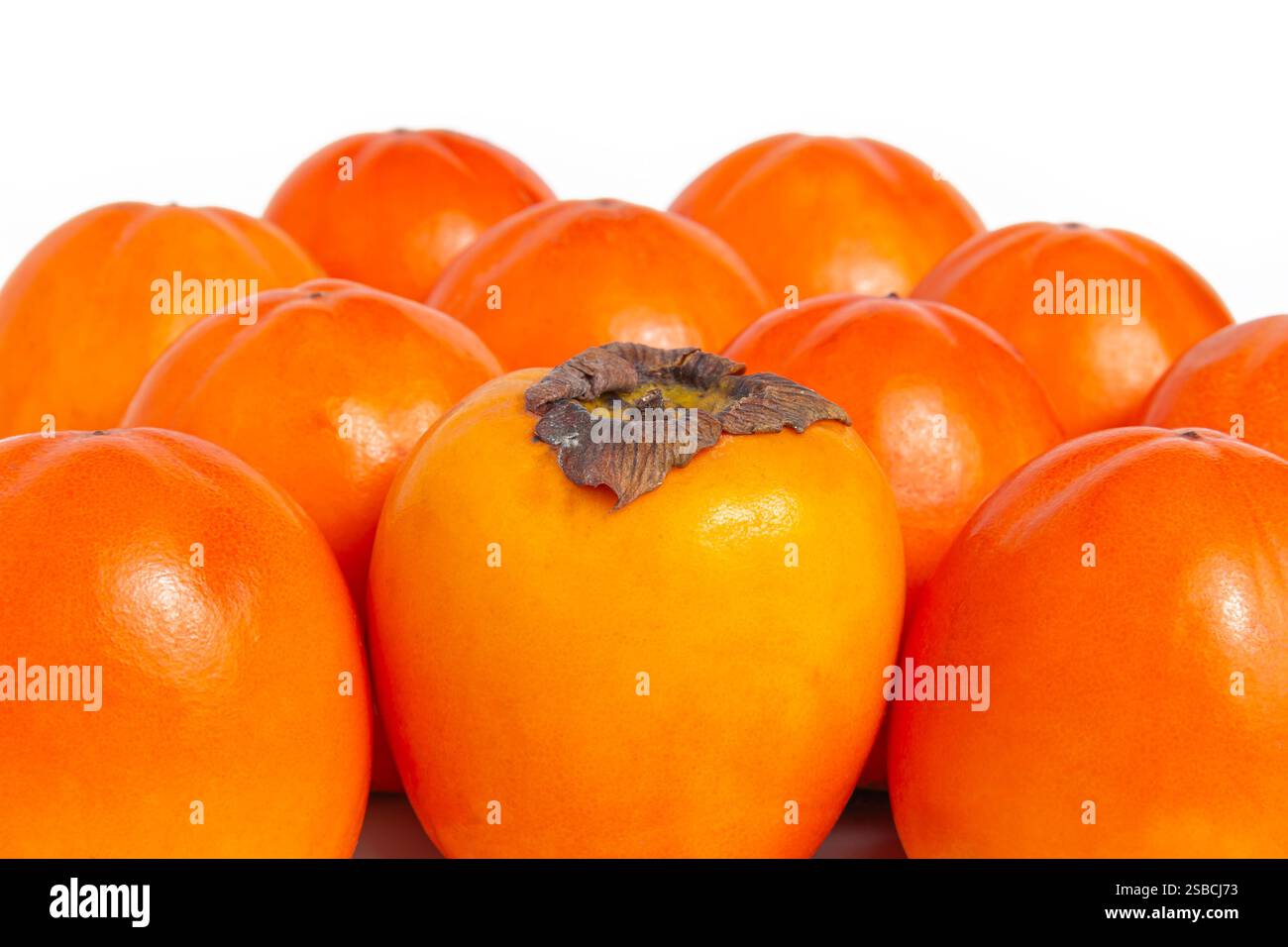 Fresh persimmons isolated on white background Stock Photo