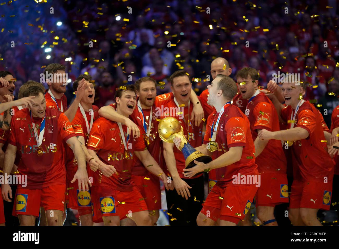 Denmark's players celebrate with the trophy after the final match