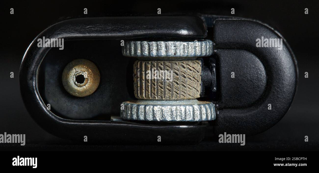 Gas lighter close-up, view from the top end. Macro photography Stock Photo