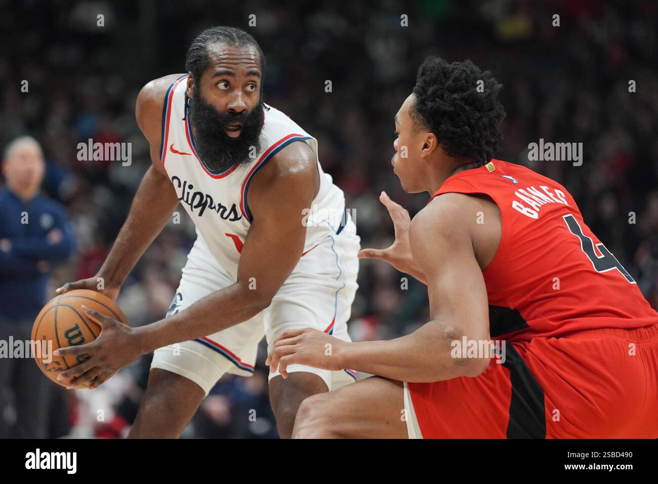LA Clippers guard James Harden (1) controls the ball as Toronto Raptors