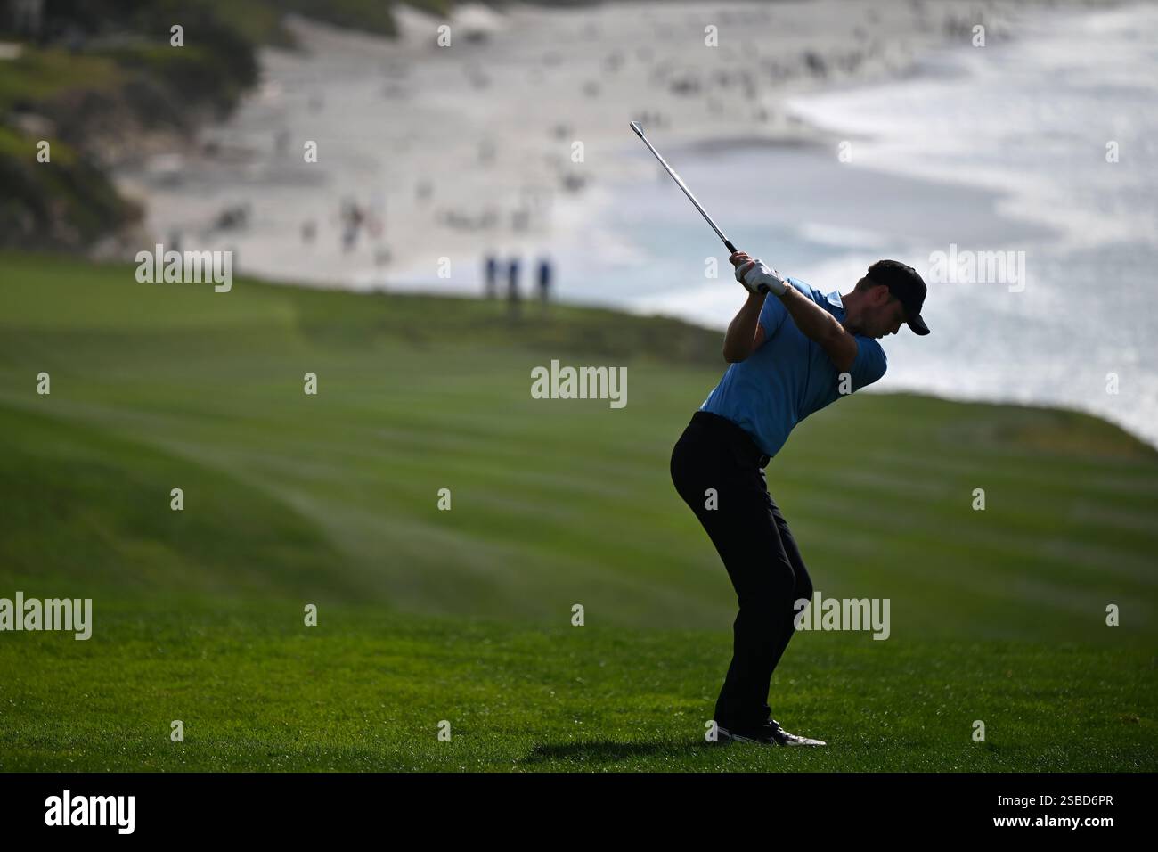 Cam Davis hits to the ninth fairway at Pebble Beach Golf Links during