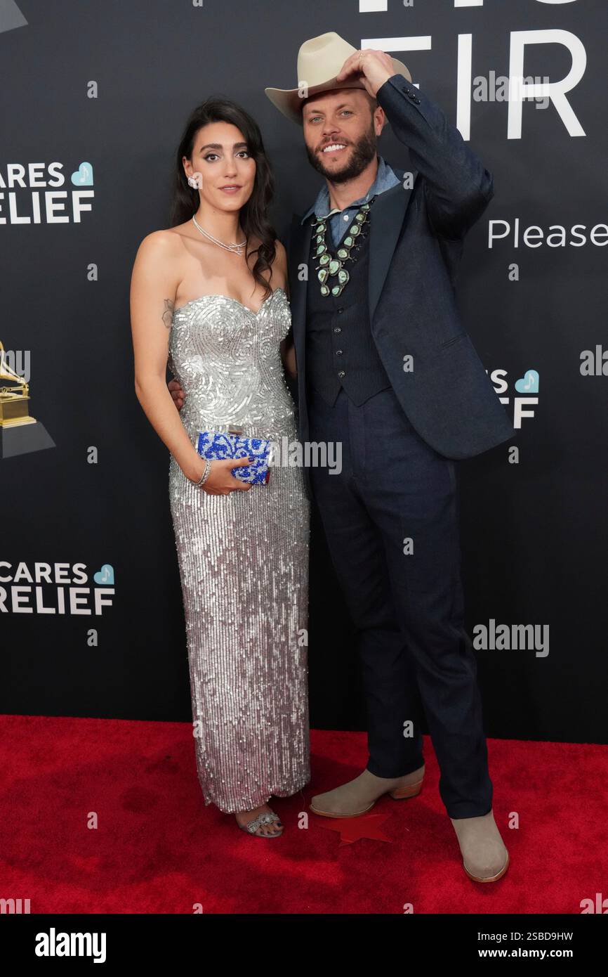 Taylor Day Grace, left, and Charley Crockett arrive at the 67th annual