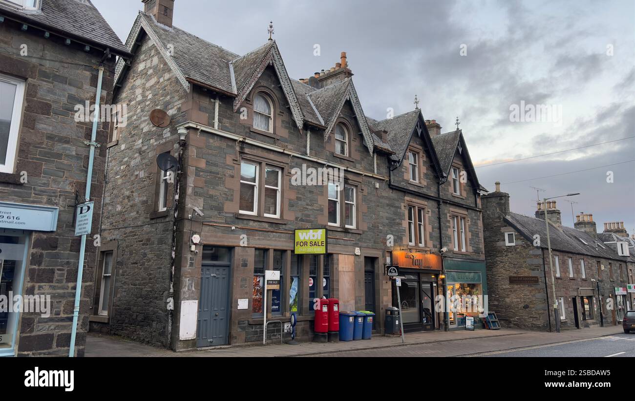 Building in the Scottish town of Aberfeldy. Scotland Highlands. Beautiful rural Scottish scene. Village life, Famous Location. Tourist destination. - Smartphone Captured Stock Image