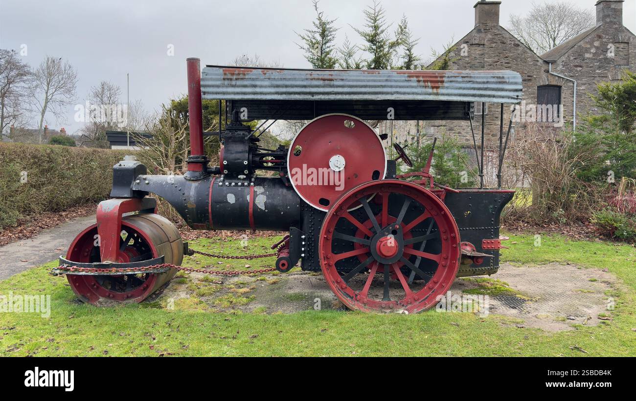 Old steam powered road roller in a public park in Aberfeldy. Scottish Highlands. Britain’s industrial past. Steam locomotion. - Smartphone Captured Stock Image