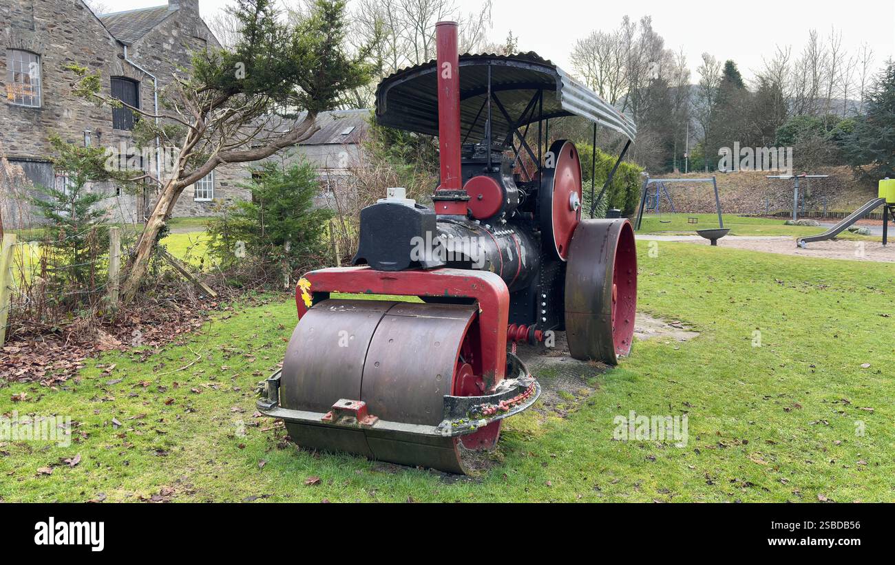 Old steam powered road roller in a public park in Aberfeldy. Scottish Highlands. Britain’s industrial past. Steam locomotion. - Smartphone Captured Stock Image