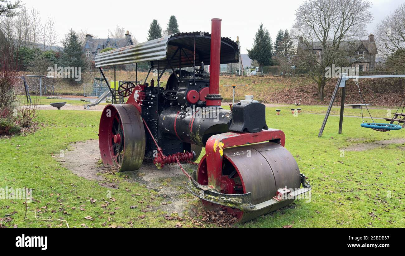 Old steam powered road roller in a public park in Aberfeldy. Scottish Highlands. Britain’s industrial past. Steam locomotion. - Smartphone Captured Stock Image