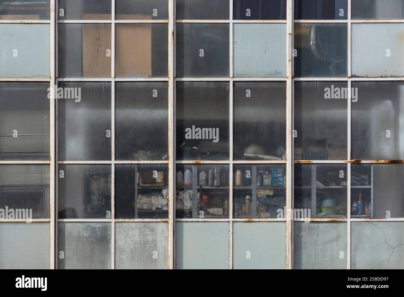 A weathered facade of an industrial building in the Deusto district of ...