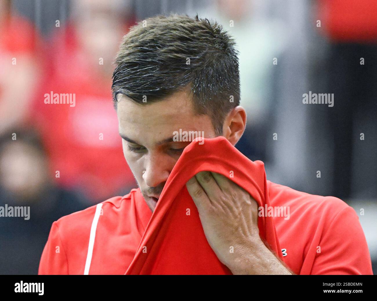 Alexis Galarneau, of Canada, reacts during his Davis Cup qualifying