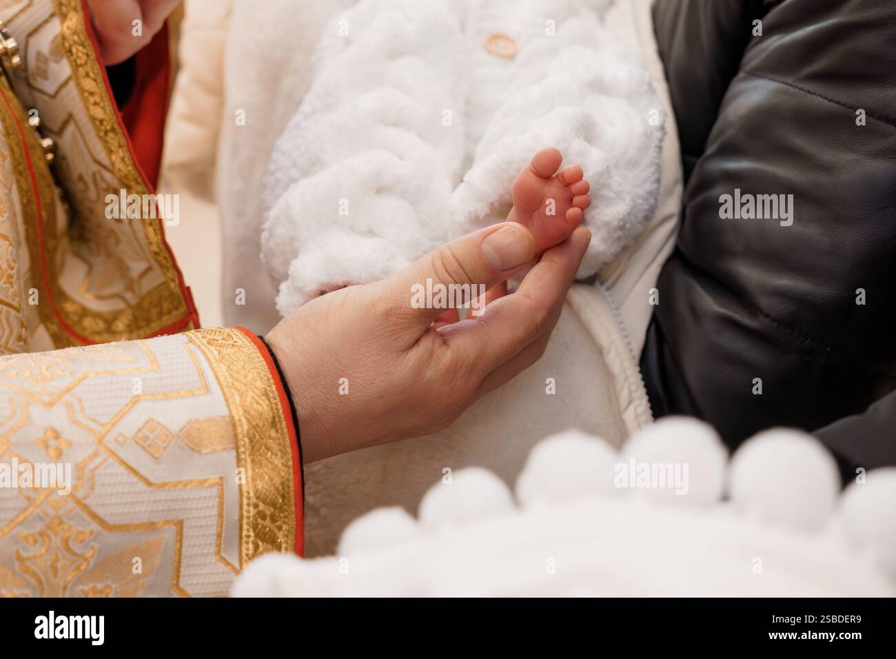 Religious Ceremony with Infant Blessing in Traditional Attire Stock ...