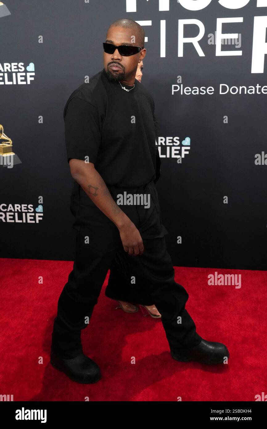 Kanye West, left, and Bianca Censori arrive at the 67th annual Grammy Awards on Sunday, Feb. 2