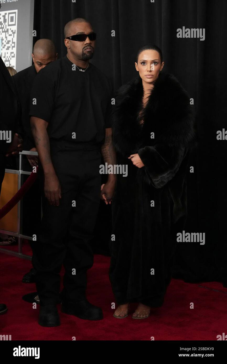 Kanye West, left, and Bianca Censori arrive at the 67th annual Grammy