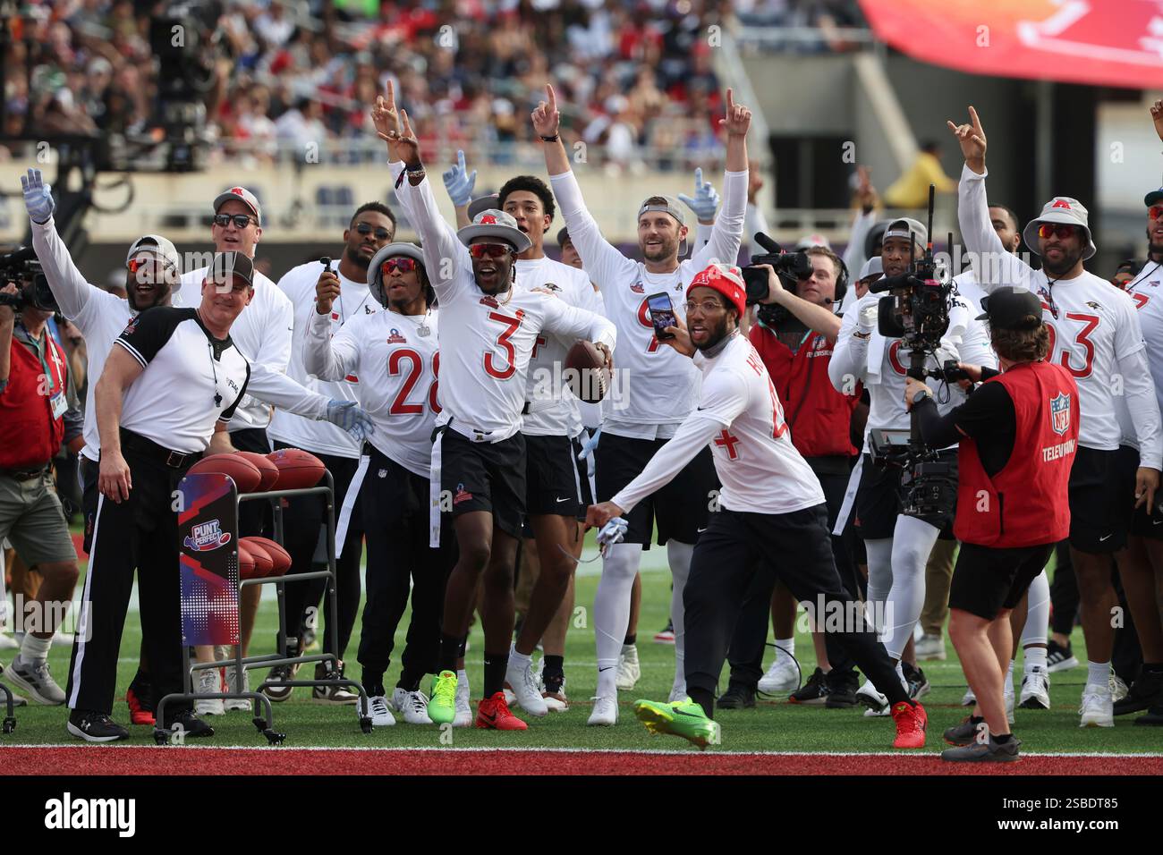 AFC players celebrate after winning th punting competition during the