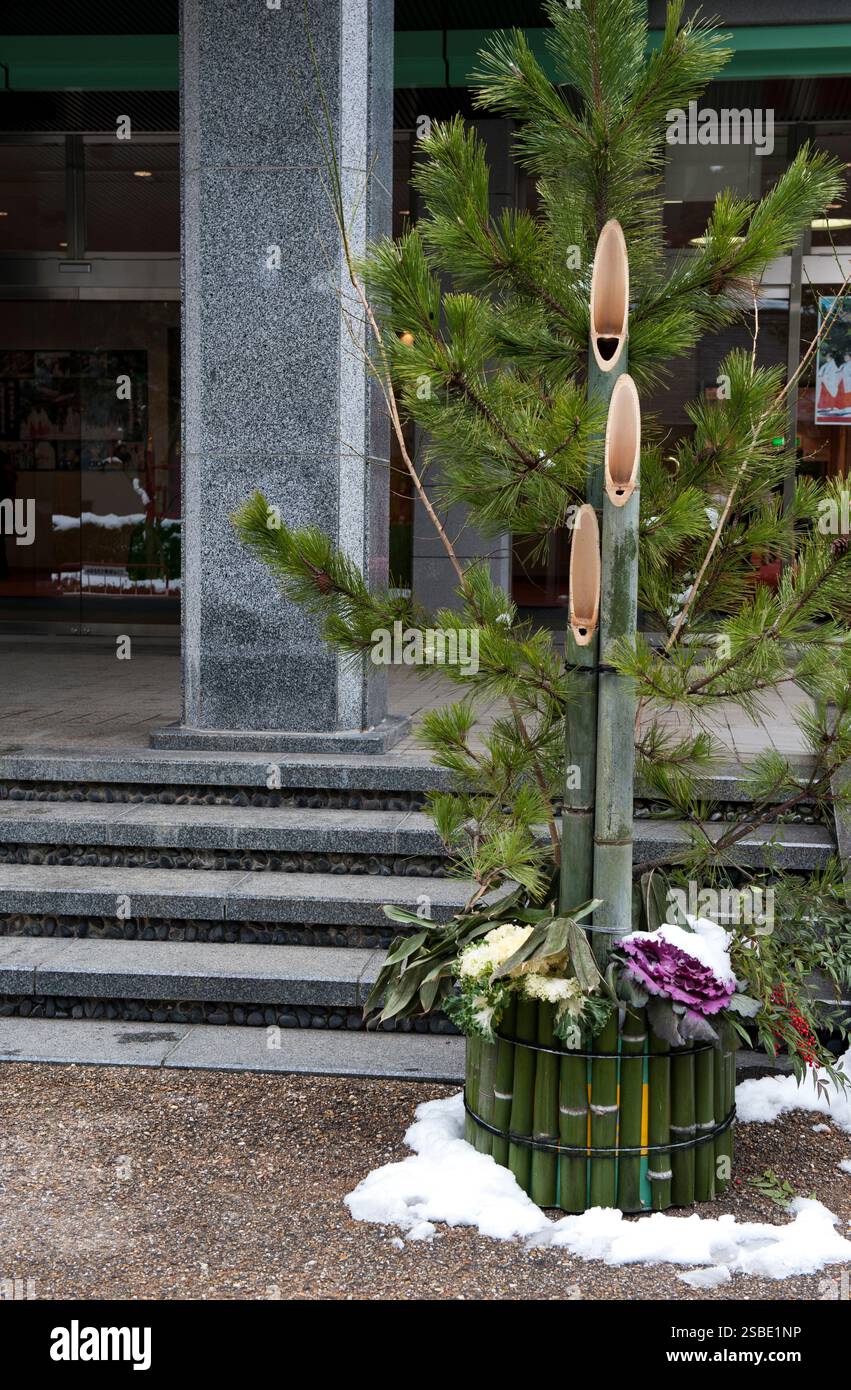 Kadomatsu are traditional decorations of bamboo, pine and plum branches displayed during the New Year at the entrances to welcome good fortune. Stock Photo