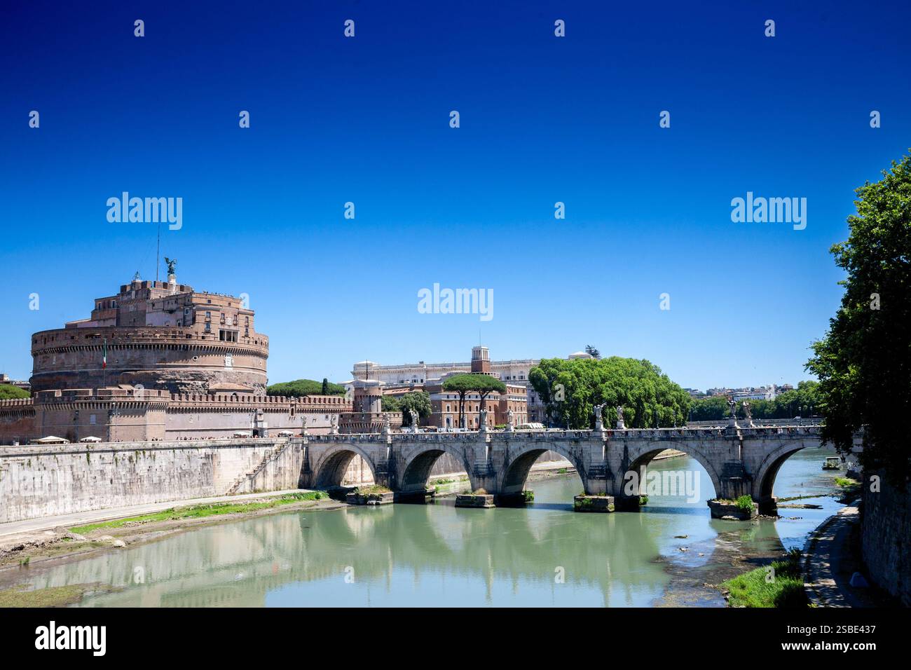 Castel Sant’Angelo rises beside the Tiber, with Ponte Sant’Angelo ...