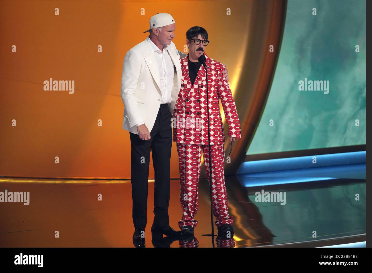 Chad Smith, left, and Anthony Kiedis of Red Hot Chili Peppers presents