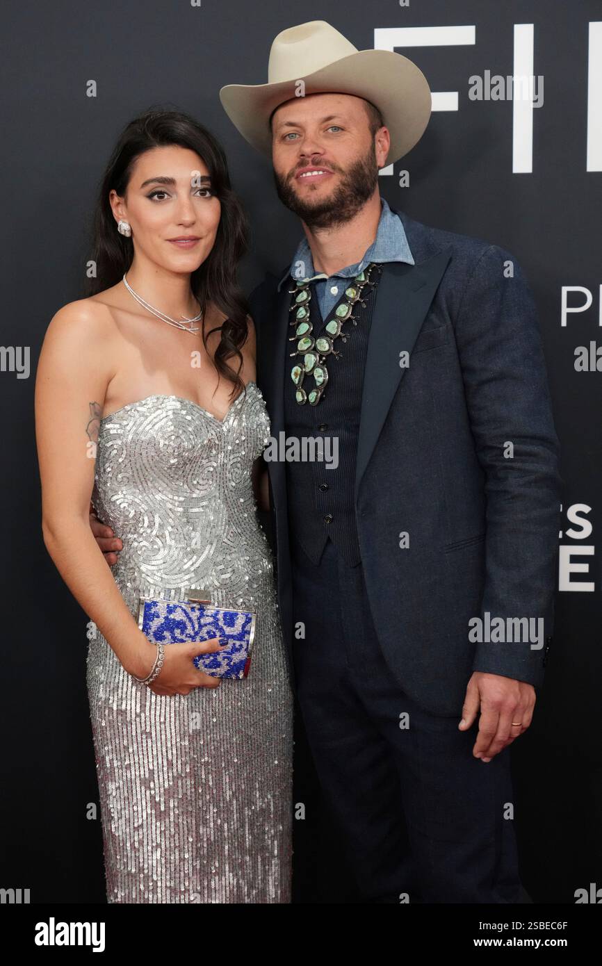 Taylor Day Grace, left, and Charley Crockett arrive at the 67th annual