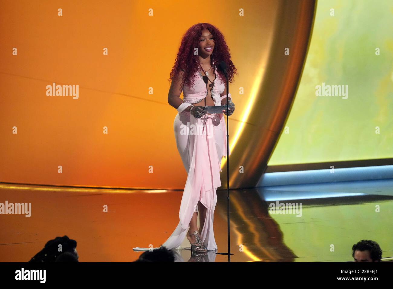 SZA presents the award for best pop duo/group performance during the