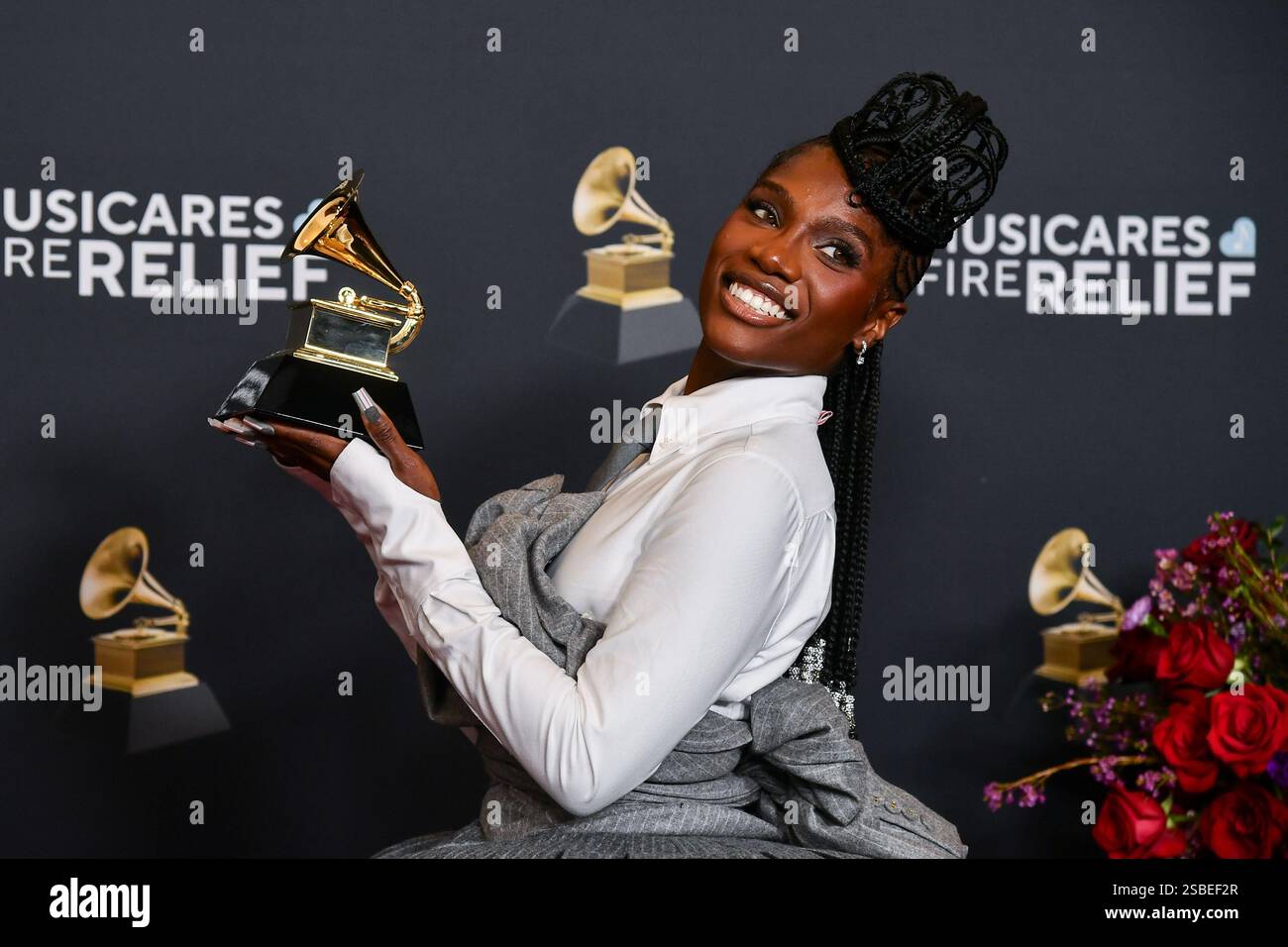 Doechii Rapping Doechii poses in the press room with the award for best rap album for ...