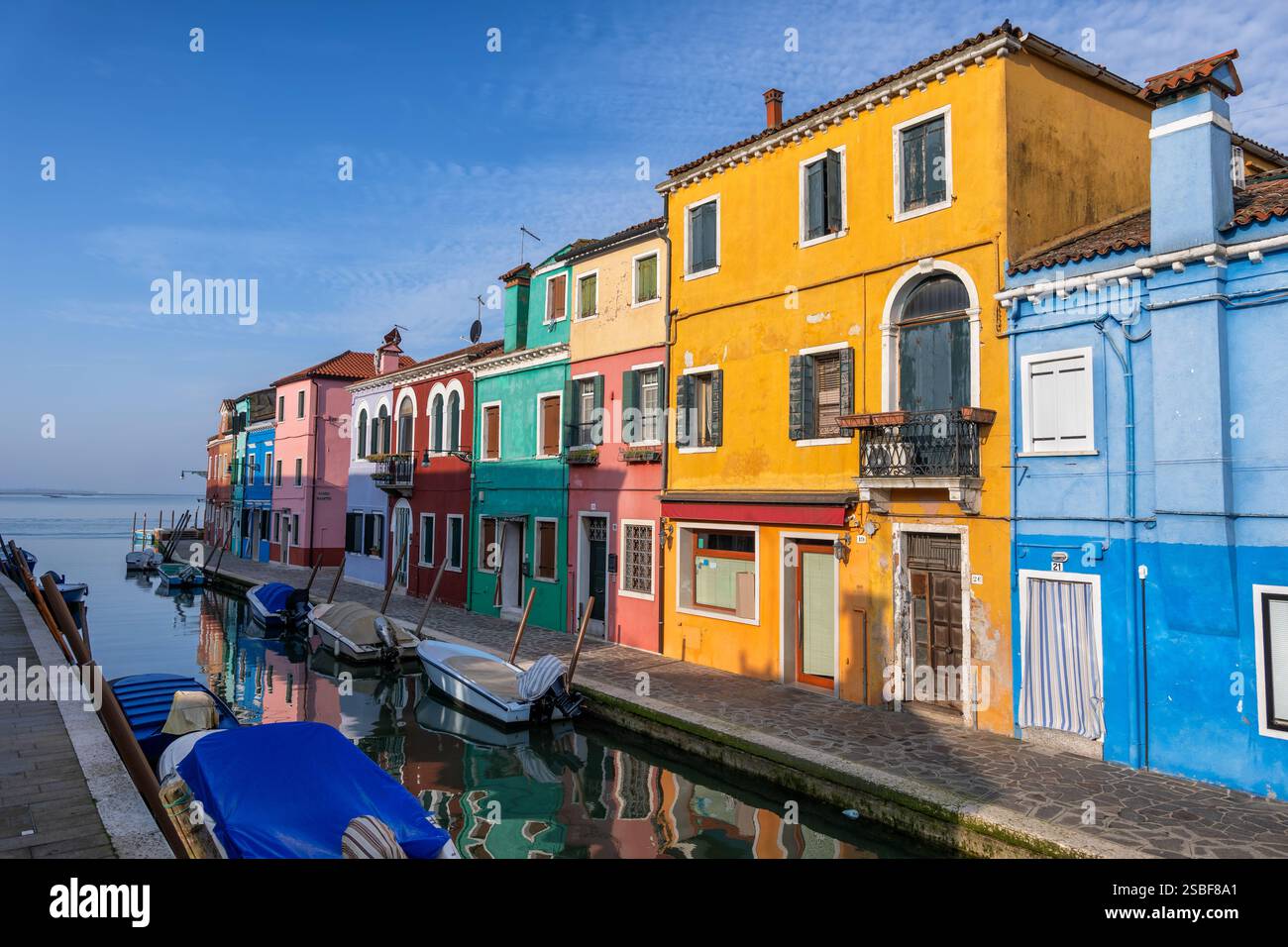 Old houses with colorful facades and canal on Burano Island in Venice ...