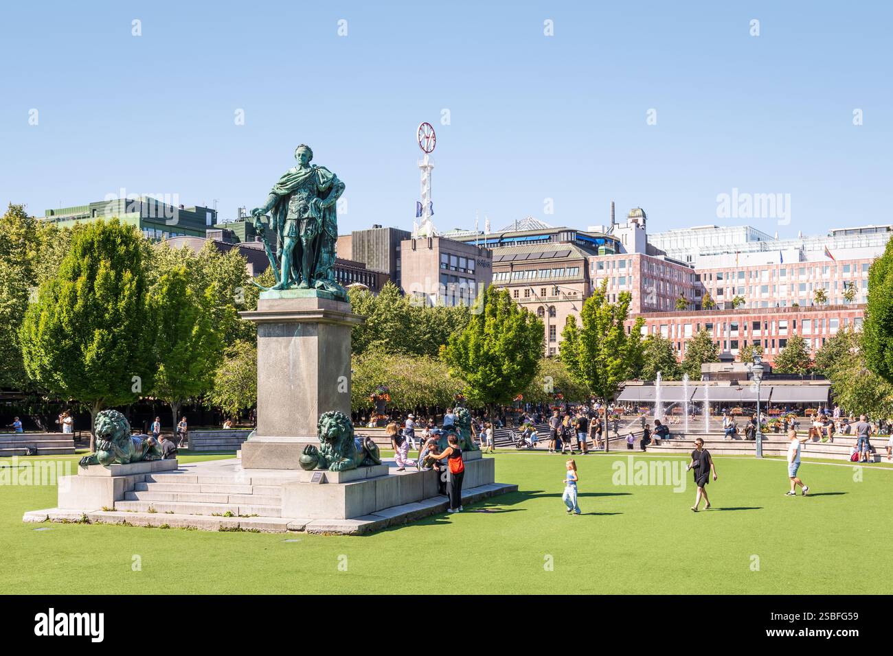 People enjoy the Kungsträdgården (King's Garden) in Stockholm, Sweden ...
