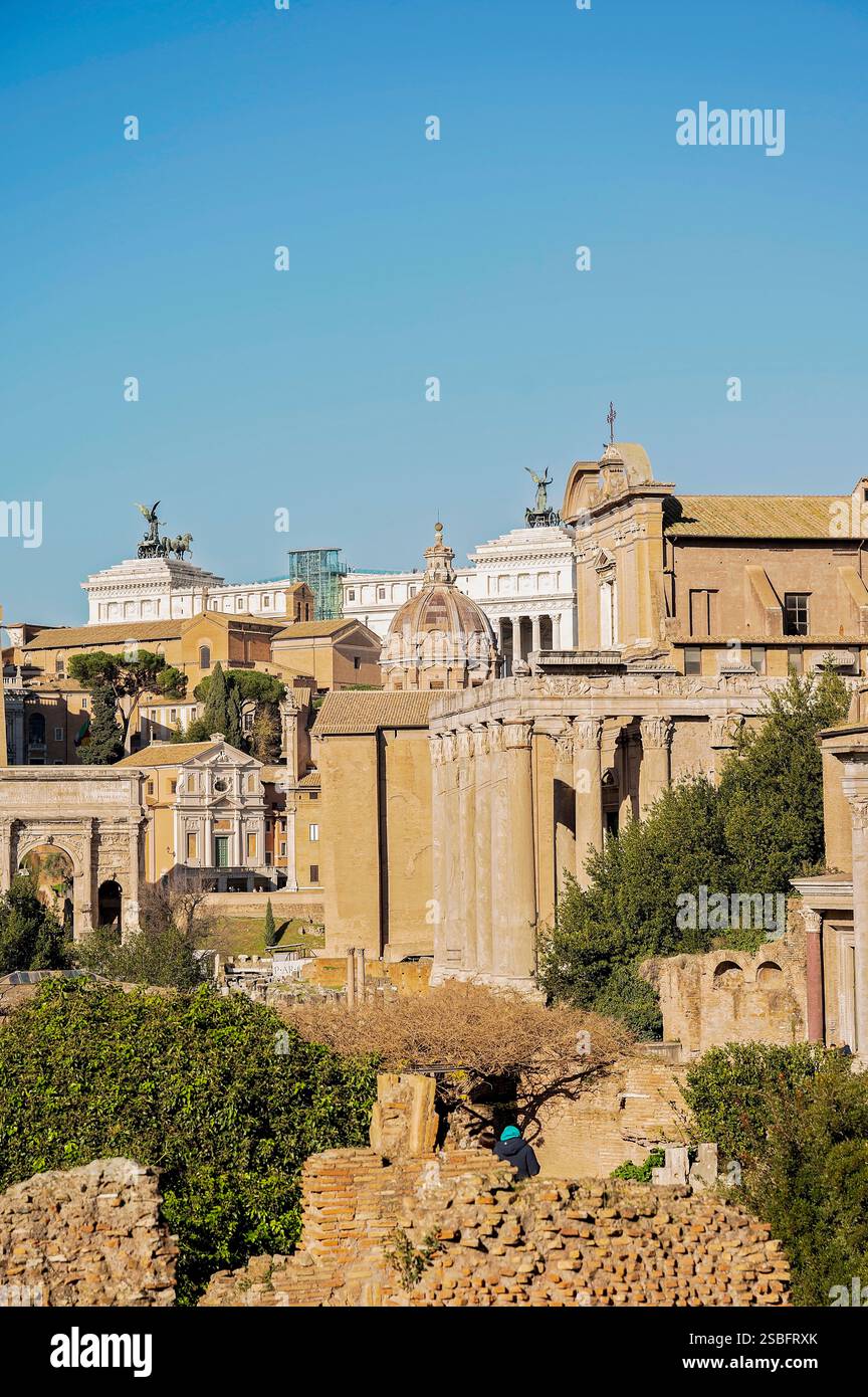 Ancient Roman ruins with city landmarks in Rome, Italy Stock Photo - Alamy