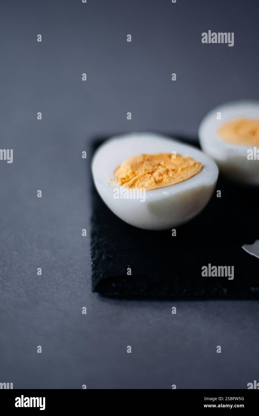 Boiled chicken egg cut in a half Stock Photo