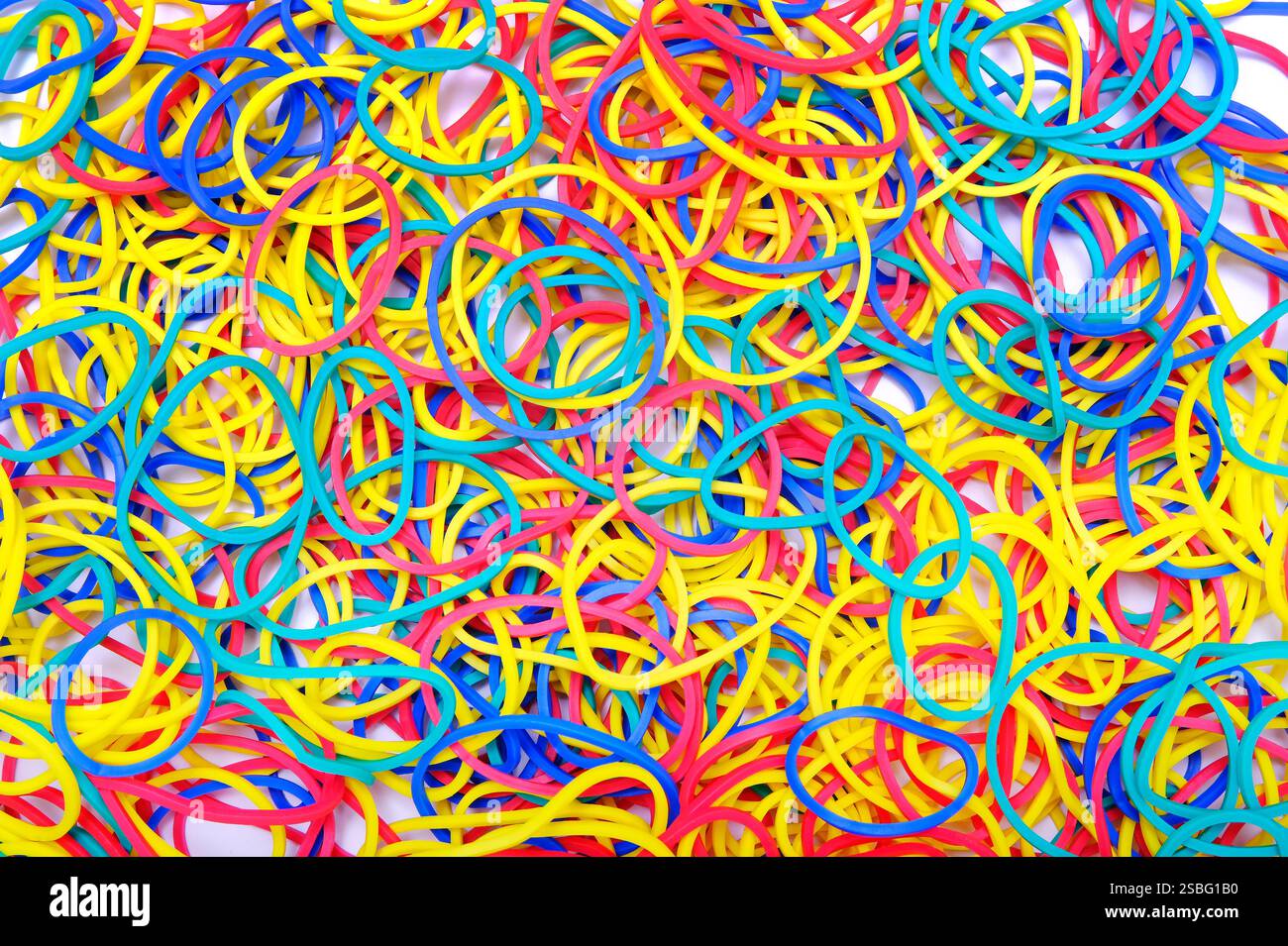 selection of colourful elastic bands background Stock Photo