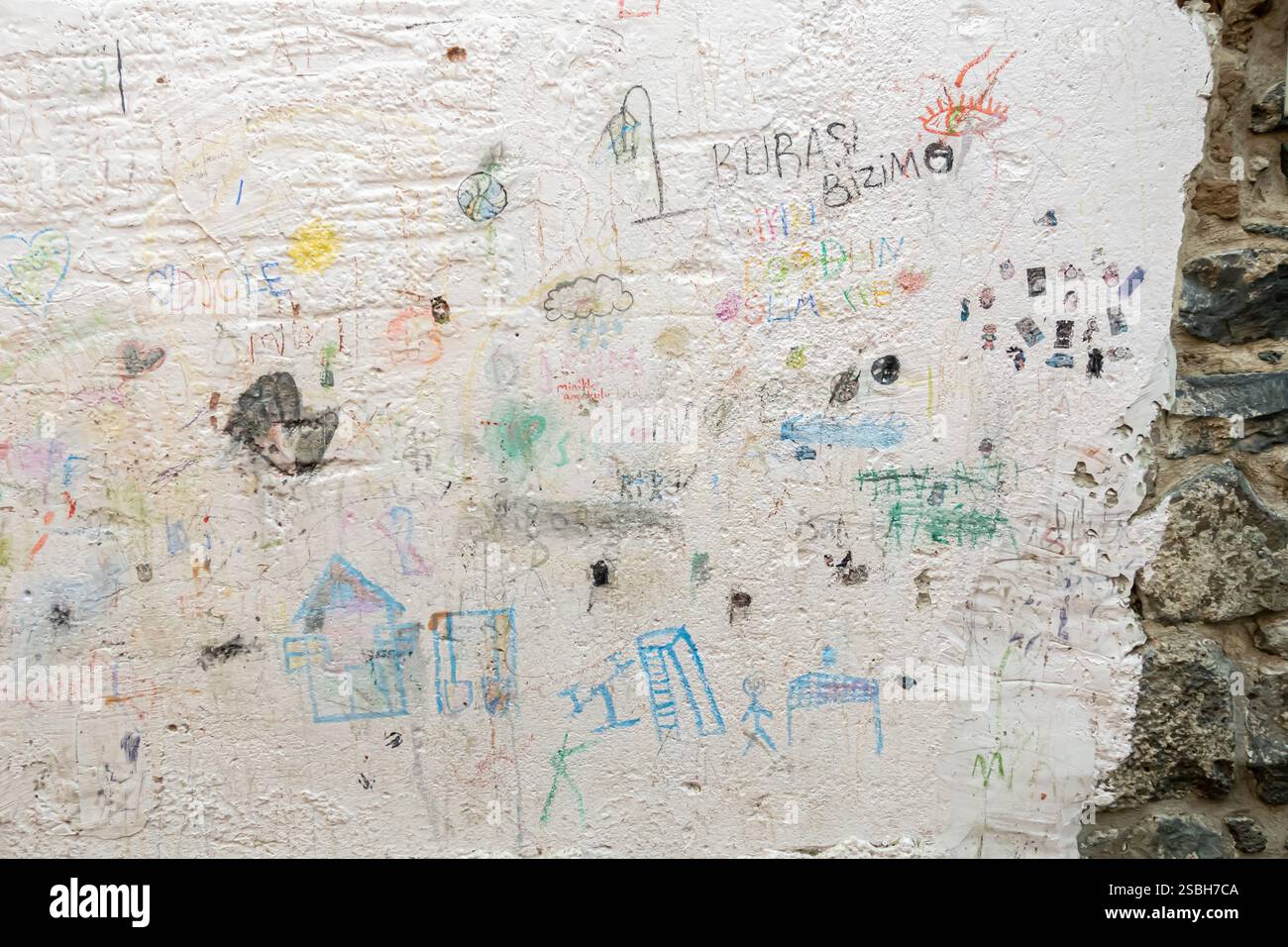 Childrens chalkdrawings on the wall Diyarbakır Turkey Turkiye Stock Photo