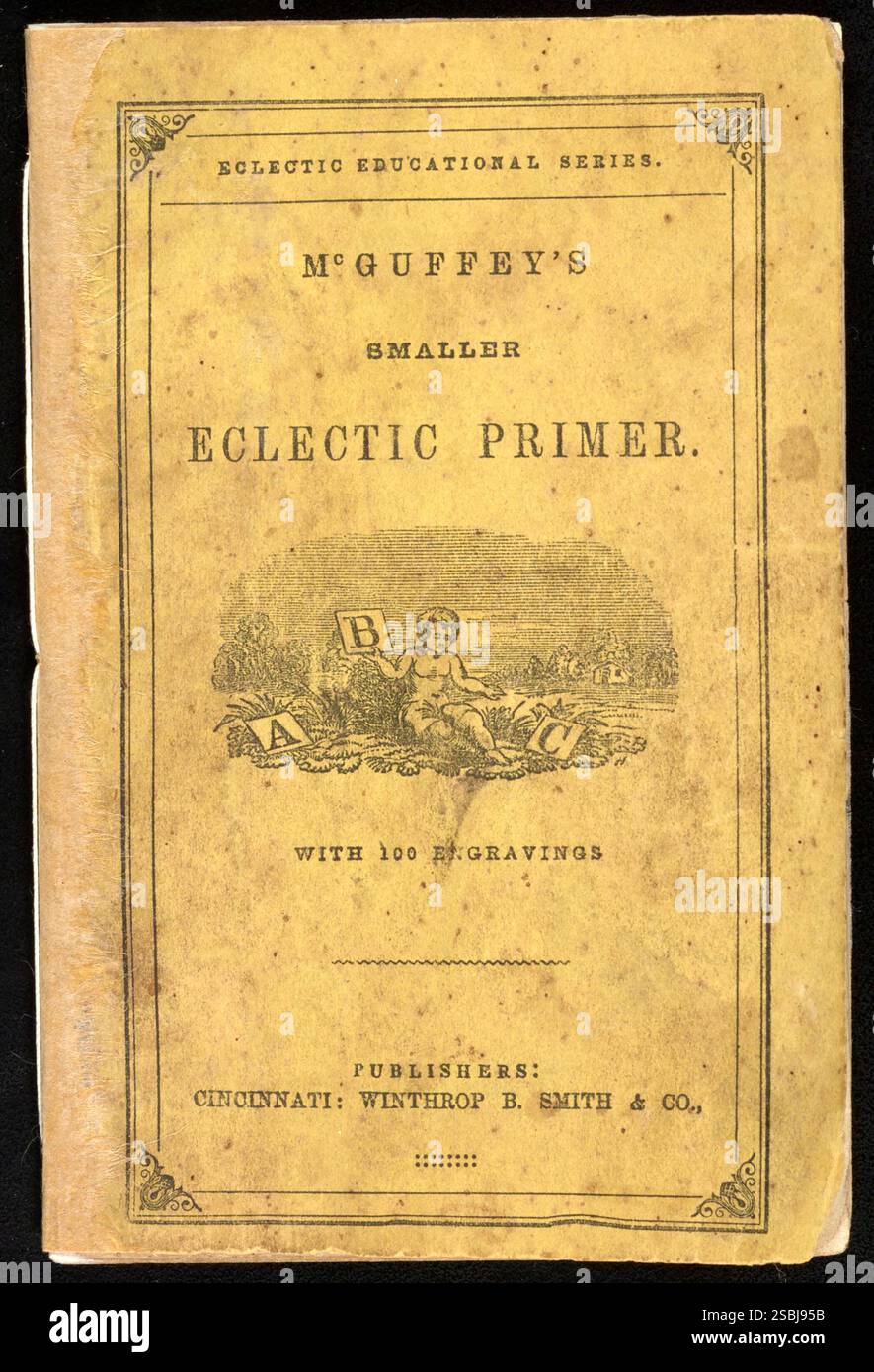 A copy of McGuffey's Eclectic Primer, circa 1860. William Holmes McGuffey (1800-1873) was an American college professor and president who is best known for writing the McGuffey Readers, the first widely used series of elementary school-level textbooks. More than 120 million copies of McGuffey Readers were sold between 1836 and 1960. Stock Photo