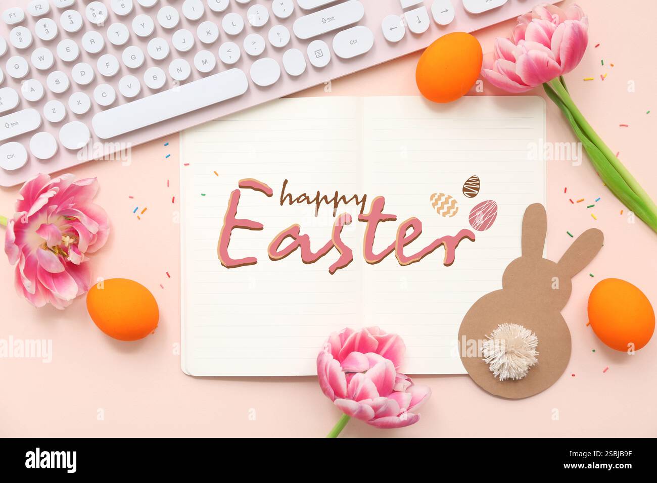 Beautiful greeting card for Happy Easter with computer keyboard Stock Photo