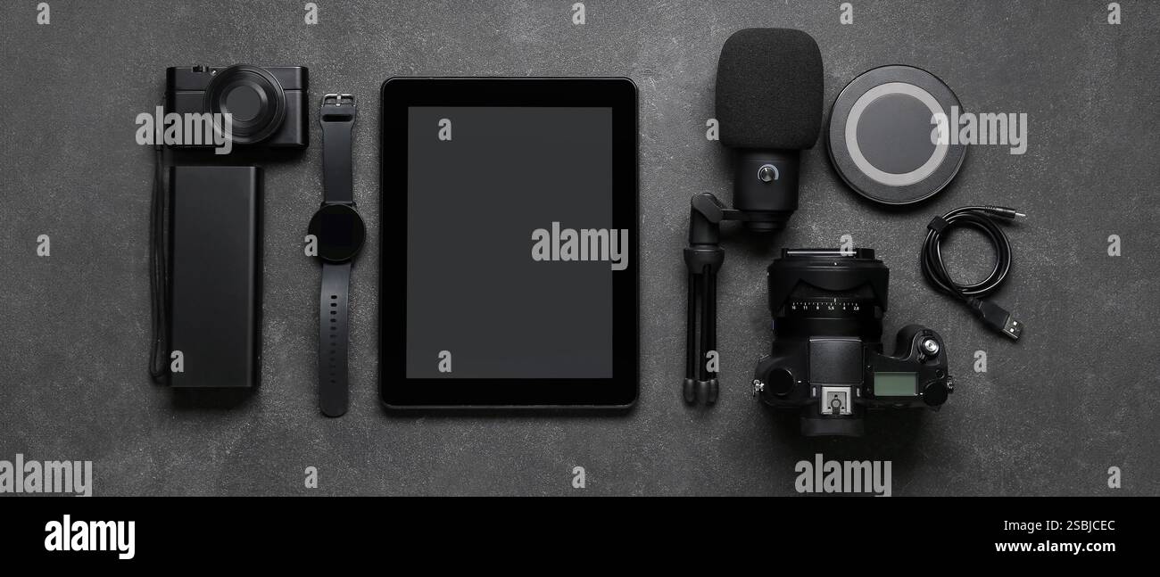 Set of different gadgets on dark background Stock Photo
