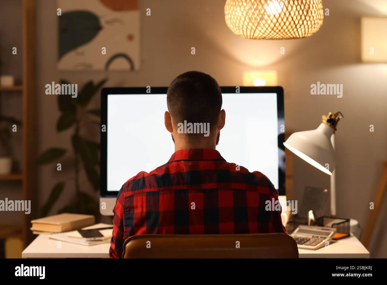 Back view of man computer night hi-res stock photography and images - Alamy