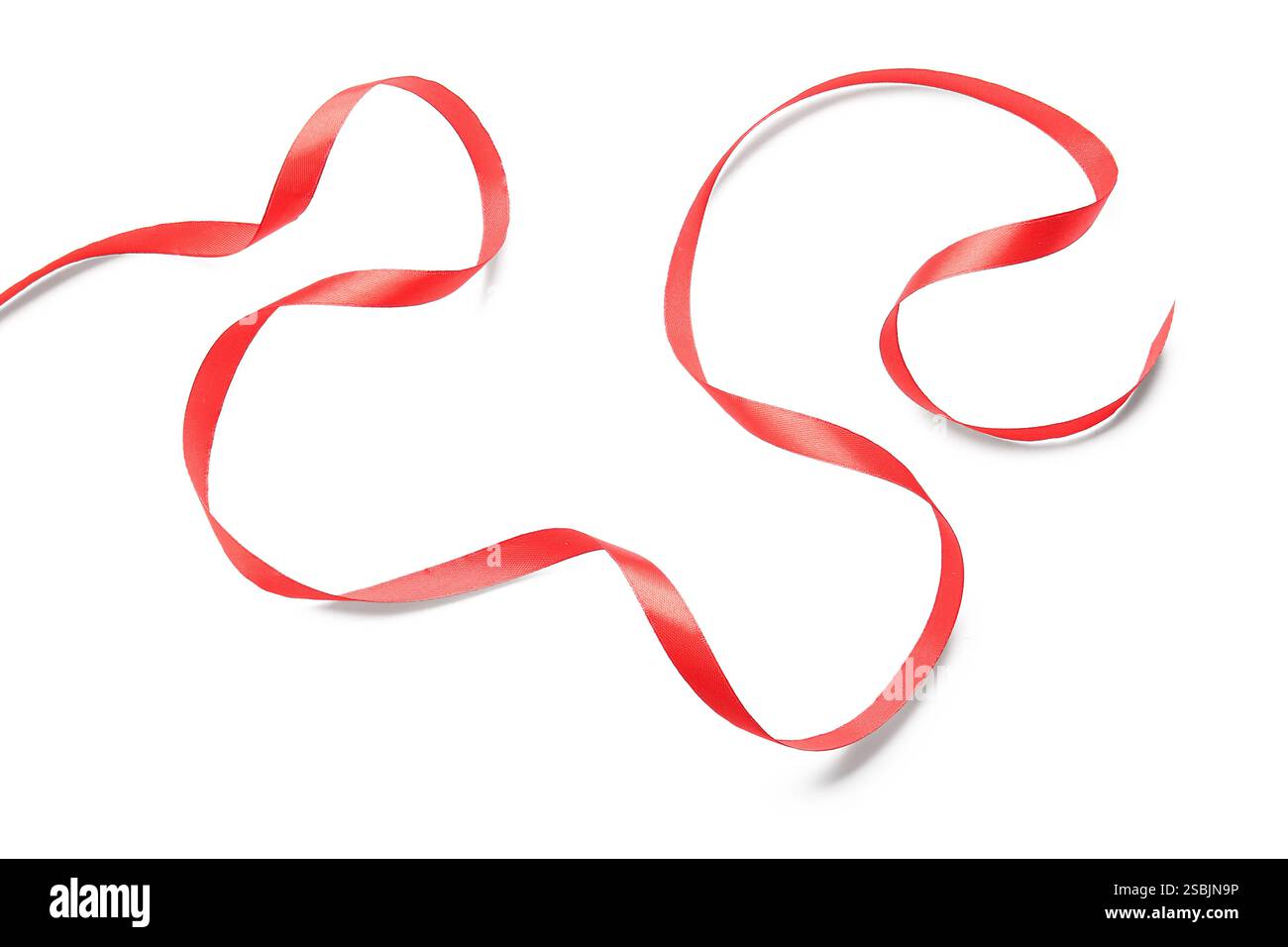 Red satin ribbon isolated on white background Stock Photo - Alamy