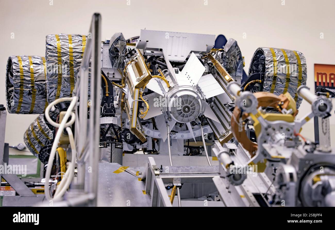 This image shows the Mars 2020 Perseverance rover being connected to ...
